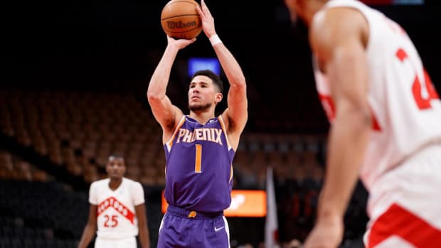 NBA Fans Destroyed Devin Booker After He Complained About The Raptors Mascot In Empty Arena: "This May Be The Softest Thing I’ve Ever Seen & Further Proves That This Era Of Basketball Is Soft As Hell"
