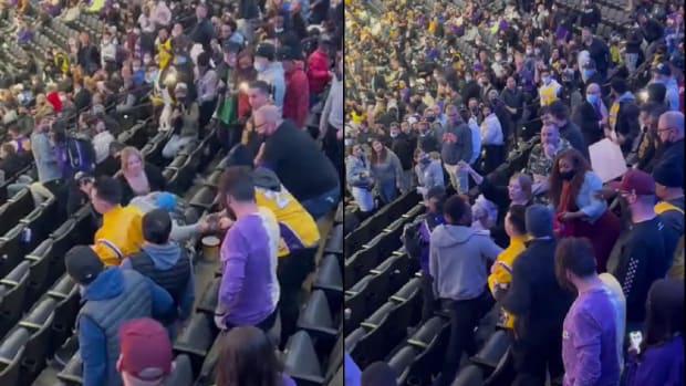 A Woman Threw Punches To Protect Her Man During Lakers-Kings Game