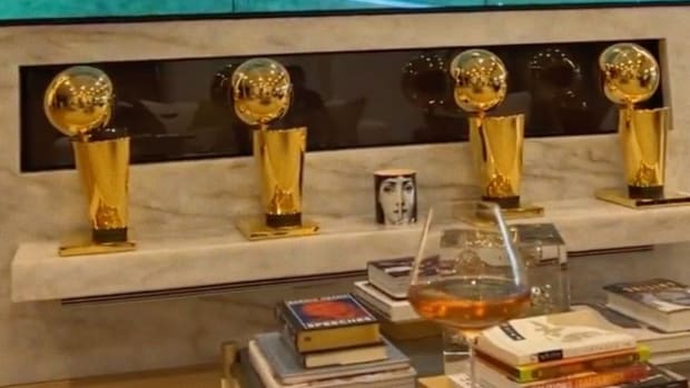 LeBron James Flexes With 4 NBA Championships In The Front Of His TV Setup
