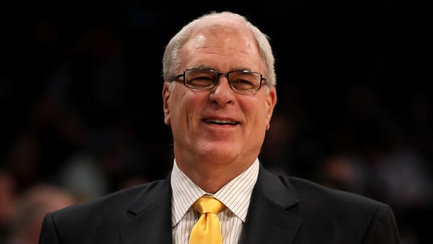 Lakers Fans Want Phil Jackson Back With The Team After He Was Spotted During The Warriors Win: "Fire Vogel And Hire Him."