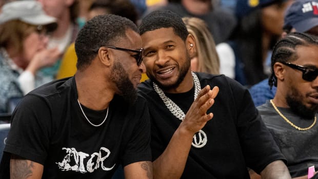 Ja Morant’s Father Goes Viral After Being Caught Hitting It Up With His Doppelganger, Usher