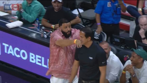 DJ Khaled Runs Up To Retrieve Out-Of-Bounds Ball For Miami Heat; Gives Coach Erik Spoelstra A Back Rub On His Way Out