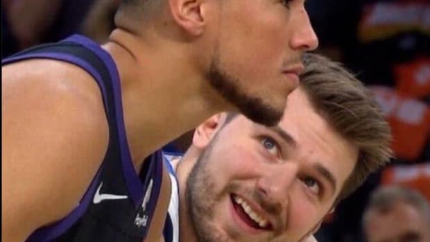 NBA Fan Posts A Photo Of Luka Doncic Looking At Devin Booker, Could Become A New Meme: "Everybody Acts Tough When They Up"