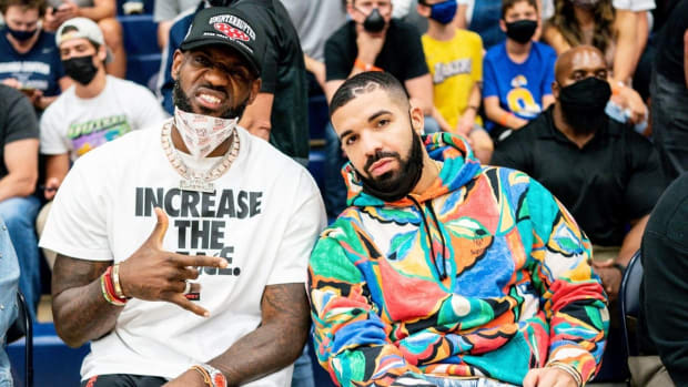 Drake Shares Adorable Video Of His Son Playing Basketball In A LeBron James Jersey, Tags LeBron In The Post: “Where Is He Getting The Mannerisms From?”
