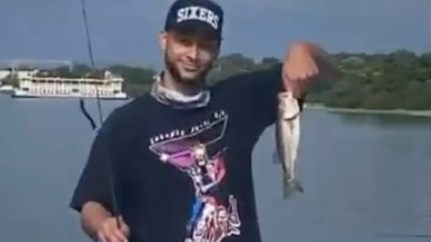 NBA Fans Troll Ben Simmons After He Fails Throwing A Fish Into A Lake