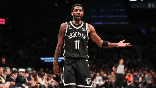 Nets' Kyrie Irving, Heat's Bam Ado prevented from postgame