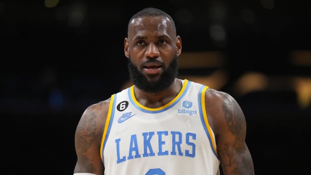 LeBron James limps off floor with injury as Lakers season hits new low