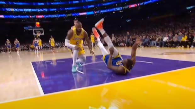 Video: Draymond Green Slams Head On The Floor After Colliding With LeBron James