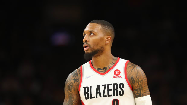 Blazers star Damian Lillard hilariously gets water bottle in jersey swap  with Heat's Bam Ado 