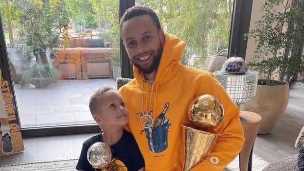 Ayesha Curry Shares Wholesome Picture Of Stephen Curry And His Son With The Finals MVP Trophy: "God Is Good, All The Time."