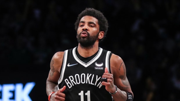 Shams Charania Says Kyrie Irving Plans On Staying With The Brooklyn Nets This Season No Matter What Happens With Kevin Durant