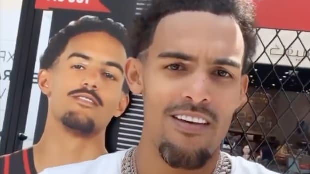 Trae Young Posted A Hilarious Video About A Cardboard Cutout Of Him That Was Too Short: "This Ain't My Height, Come On Now"