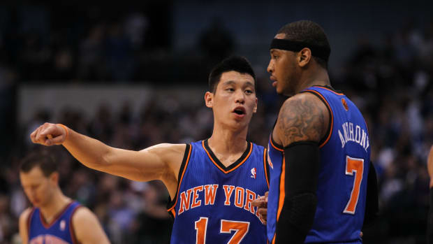 Mar 6, 2012; Dallas, TX, USA; New York Knicks guard Jeremy Lin (17) talks with forward Carmelo Anthony (7) in the first quarter against the Dallas Mavericks at American Airlines Center. Mandatory Credit: Matthew Emmons-Imagn Images