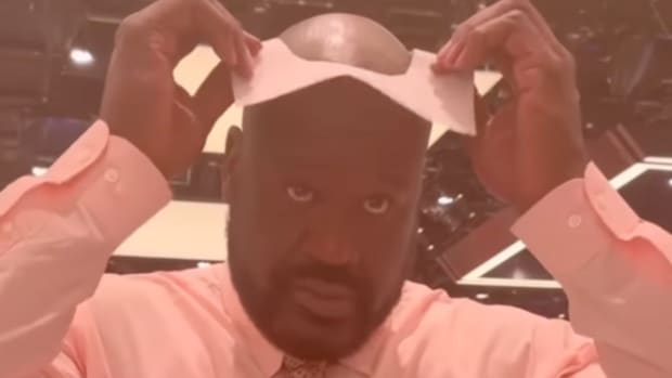 Shaquille O'Neal Hilariously Pokes His Head Through Paper Without Ripping It