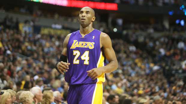 Los Angeles Lakers forward Kobe Bryant (24) shoots the ball during the first quarter against the Utah Jazz at Vivint Smart Home Arena. Mandatory Credit: Chris Humphreys-USA TODAY Sports
