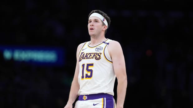 Los Angeles, California, USA; Los Angeles Lakers guard Austin Reaves (15) reacts against the Phoenix Suns in the second half at Crypto.com Arena. Mandatory Credit: Kirby Lee-Imagn Images