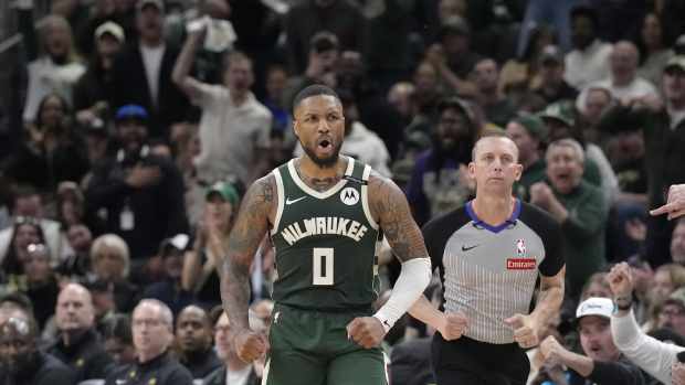 Milwaukee Bucks guard Damian Lillard (0) reacts after making a basket against the Indiana Pacers in the second half during game three of first round for the 2024 NBA Playoffs at Fiserv Forum. Mandatory Credit: Michael McLoone-Imagn Images