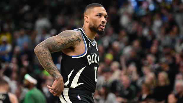 Milwaukee Bucks guard Damian Lillard (0) looks on in the first quarter during game four against the Indiana Pacers of first round for the 2024 NBA Playoffs at Fiserv Forum. Lillard left the game early in the in the first quarter with an injury.