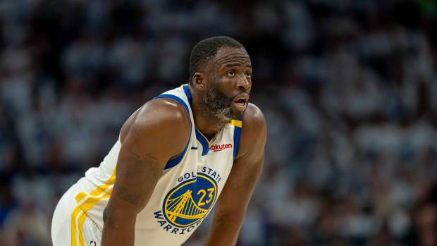 May 8, 2025; Minneapolis, Minnesota, USA; Golden State Warriors forward Draymond Green (23) looks on against the Minnesota Timberwolves in the second half during game two of the second round for the 2025 NBA Playoffs at Target Center. Mandatory Credit: Jesse Johnson-Imagn Images  