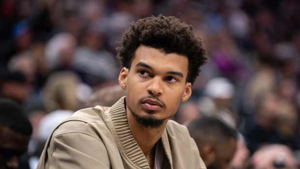 Mar 7, 2025; Sacramento, California, USA; San Antonio Spurs center Victor Wembanyama (1) looks on from the bench during the fourth quarter of the game against the Sacramento Kings at Golden 1 Center. Mandatory Credit: Ed Szczepanski-Imagn Images  