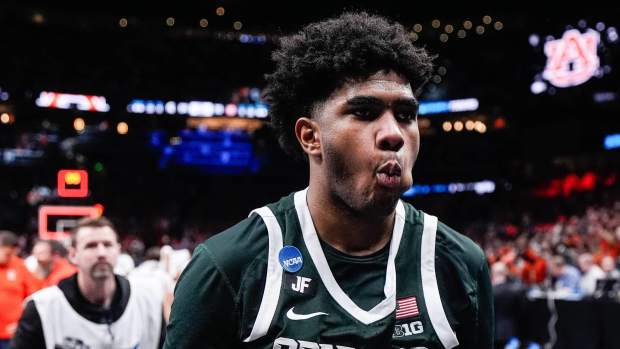 Michigan State guard Jase Richardson (11) exits the court after 70-64 loss to Auburn at the Elite Eight round of NCAA tournament at State Farm Arena in Atlanta, Ga. on Sunday, March 30, 2025.