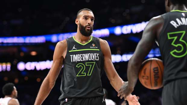 Philadelphia, Pennsylvania, USA; Minnesota Timberwolves center Rudy Gobert (27) looks on against the Philadelphia 76ers in the fourth quarter at Wells Fargo Center. Mandatory Credit: Kyle Ross-Imagn Images