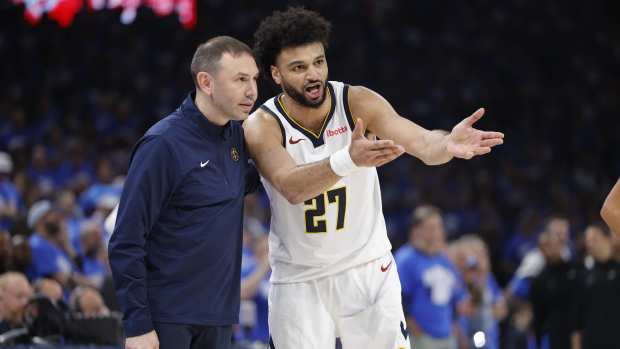 May 18, 2025; Oklahoma City, Oklahoma, USA; Denver Nuggets guard Jamal Murray (27) talks to head coach David Adelman in the second quarter against the Oklahoma City Thunder during game seven of the second round for the 2025 NBA Playoffs at Paycom Center.
