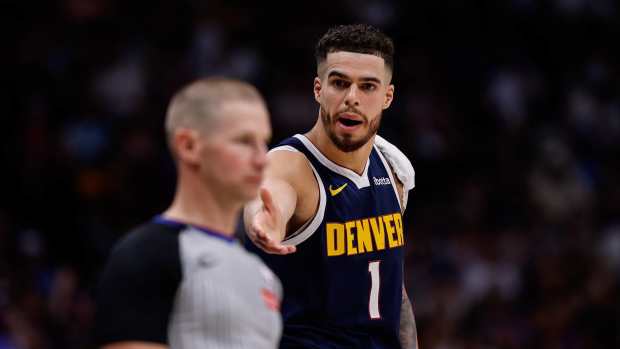 May 11, 2025; Denver, Colorado, USA; Denver Nuggets forward Michael Porter Jr. (1) gestures to referee Tyler Ford in the second quarter against the Oklahoma City Thunder during game four of the second round of the 2025 NBA Playoffs at Ball Arena.