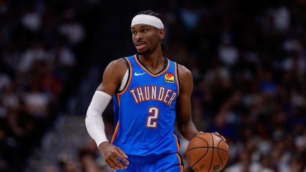 Oklahoma City Thunder guard Shai Gilgeous-Alexander (2) dribbles the ball up court in the second quarter against the Denver Nuggets during game six of the second round for the 2025 NBA Playoffs at Ball Arena.