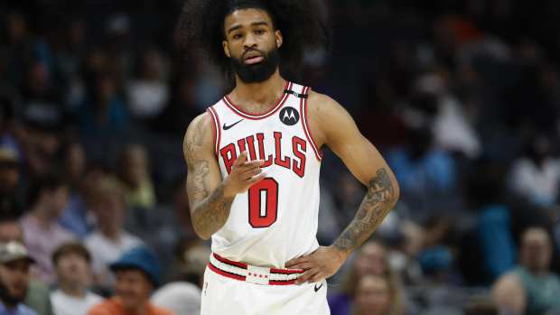 Apr 6, 2025; Charlotte, North Carolina, USA; Chicago Bulls guard Coby White (0) stands on the court during the first quarter against the Charlotte Hornets at Spectrum Center. Mandatory Credit: Nell Redmond-Imagn Images