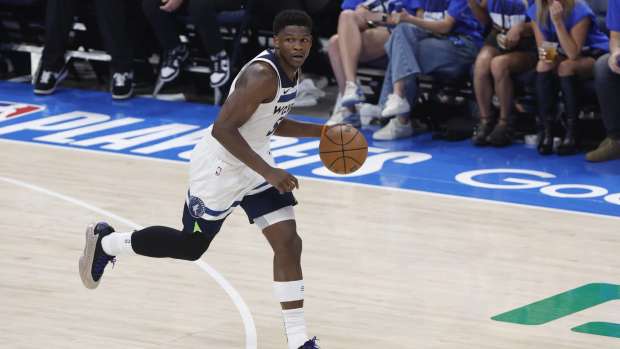 May 22, 2025; Oklahoma City, Oklahoma, USA; Minnesota Timberwolves guard Anthony Edwards (5) dribbles against the Oklahoma City Thunder in the second quarter during game two of the Western Conference Finals for the 2025 NBA Playoffs at Paycom Center.