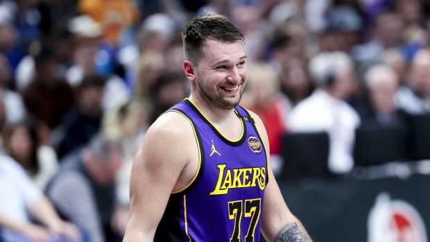 Dallas, Texas, USA; Los Angeles Lakers guard Luka Doncic (77) reacts against the Dallas Mavericks during the second half at American Airlines Center. Mandatory Credit: Kevin Jairaj-Imagn Images