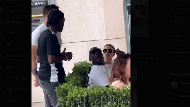 Michael Jordan Watches A Street Performer In Portugal But Refuses to Take A Picture Because Of The Adidas Shirt
