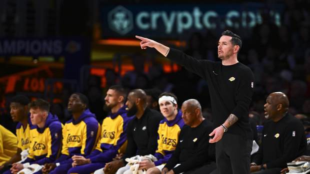 Apr 11, 2025; Los Angeles, California, USA; Los Angeles Lakers head coach JJ Redick reacts against the Houston Rockets during the second half at Crypto.com Arena. Mandatory Credit: Jonathan Hui-Imagn Images