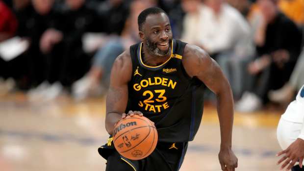 San Francisco, California, USA; Golden State Warriors forward Draymond Green (23) dribbles the ball against the Minnesota Timberwolves in the fourth quarter during game four of the second round for the 2025 NBA Playoffs at Chase Center. Mandatory Credit: Cary Edmondson-Imagn Images