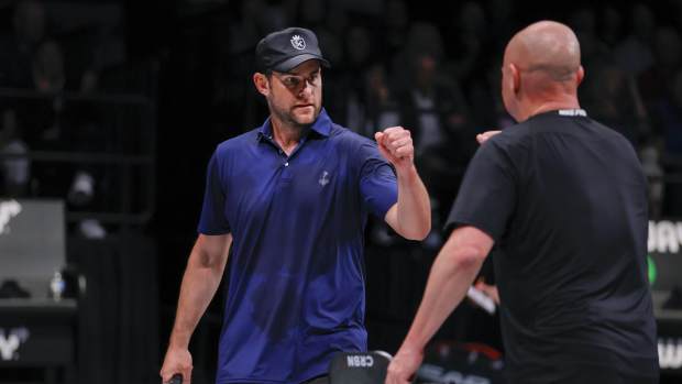 Hollywood, FL, USA; Andy Roddick (left) celebrates with Andre Agassi during the Pickleball Slam doubles match against John McEnroe (not pictured) and Michael Chang (not pictured) at Hard Rock Live at Seminole Hard Rock Hotel & Casino. Mandatory Credit: Sam Navarro-Imagn Images