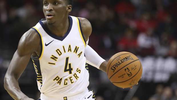 Indiana Pacers guard Victor Oladipo (4) dribbles the ball against the Houston Rockets in the second half at Toyota Center.