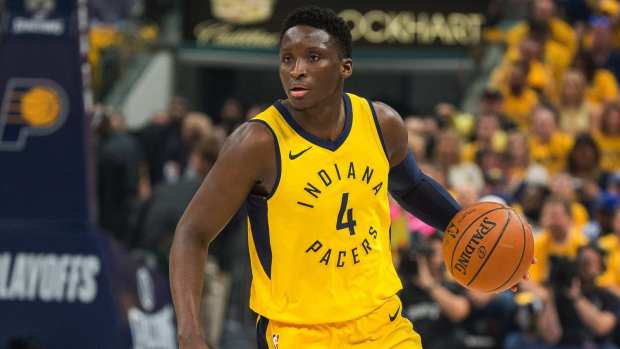 Indiana Pacers guard Victor Oladipo (4) dribbles the ball in the first half of game six against the Cleveland Cavaliers in the first round of the 2018 NBA Playoffs at Bankers Life Fieldhouse.