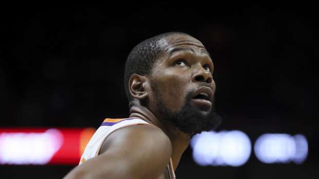 Phoenix Suns forward Kevin Durant (35) looks on from the court against the Miami Heat during the first quarter at Kaseya Center.
