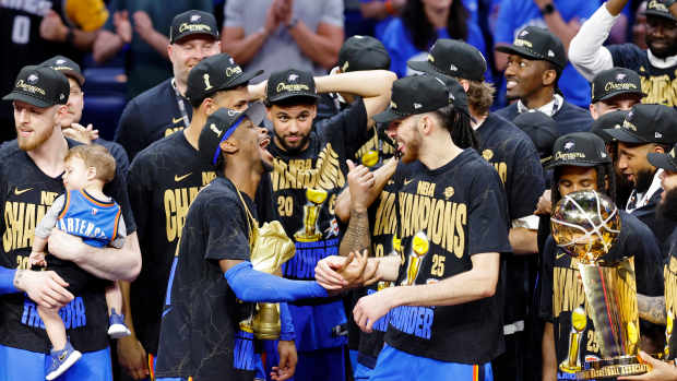 Jun 22, 2025; Oklahoma City, Oklahoma, USA; Oklahoma City Thunder guard Shai Gilgeous-Alexander (2) celebrates with Oklahoma City Thunder forward Chet Holmgren (7) after winning game seven of the 2025 NBA Finals against the Indiana Pacers at Paycom Center. Mandatory Credit: Alonzo Adams-Imagn Images  