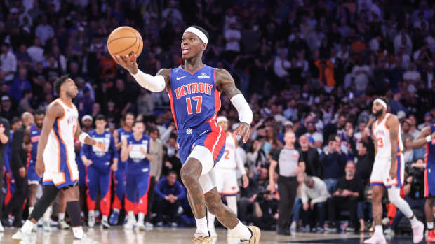 Apr 29, 2025; New York, New York, USA; Detroit Pistons guard Dennis Schroder (17) throws the ball up in the air as the time runs out in the fourth quarter against the New York Knicks during game five of first round for the 2025 NBA Playoffs at Madison Square Garden. Mandatory Credit: Wendell Cruz-Imagn Images  