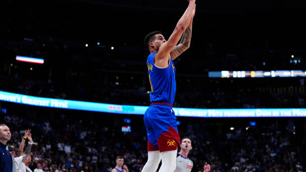 May 9, 2025; Denver, Colorado, USA; Denver Nuggets forward Michael Porter Jr. (1) shoots the ball in the fourth quarter against the Oklahoma City Thunder during game three of the second round for the 2025 NBA Playoffs at Ball Arena. Mandatory Credit: Ron Chenoy-Imagn Images