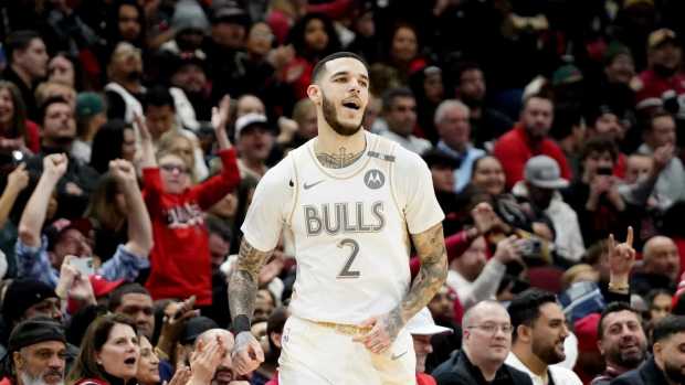 Chicago Bulls guard Lonzo Ball (2) reacts after making a three point basket against the New York Knicks during the second half at United Center.