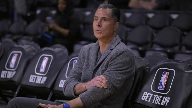 Los Angeles, California, USA; Rob Pelinka, Vice President of Operations, watches players warm up prior to the game against the Phoenix Suns at Crypto.com Arena. Mandatory Credit: Jayne Kamin-Oncea-Imagn Images