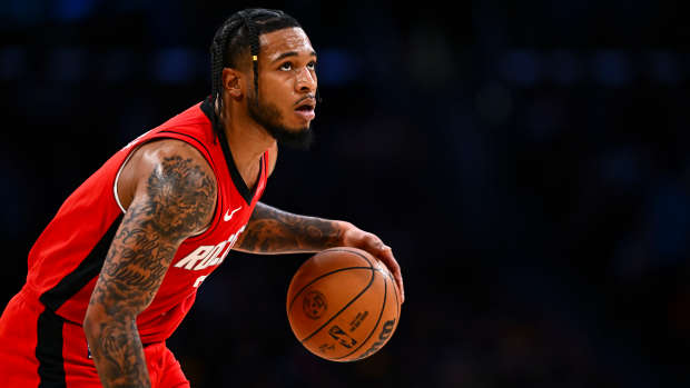Apr 11, 2025; Los Angeles, California, USA; Houston Rockets forward Cam Whitmore (7) looks to shoot against the Los Angeles Lakers during the second half at Crypto.com Arena. Mandatory Credit: Jonathan Hui-Imagn Images  