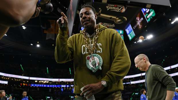 Boston, Massachusetts, USA; Boston Celtics former player Paul Pierce looks into a video camera on the court before game two of the 2024 NBA Finals between the Boston Celtics and the Dallas Mavericks at TD Garden. Mandatory Credit: Peter Casey-Imagn Images