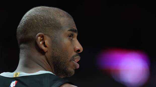 San Antonio Spurs point guard Chris Paul (3) looks on during the second half against the Portland Trail Blazers at Moda Center.
