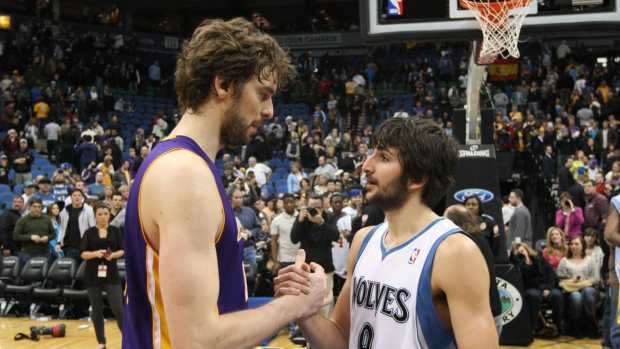 Jan 29, 2012; Minneapolis, MN, USA; Minnesota Timberwolves guard Ricky Rubio (9) talks with Los Angeles Lakers center Pau Gasol (16) following the game at the Target Center. The Lakers defeated the Timberwolves 106-101.