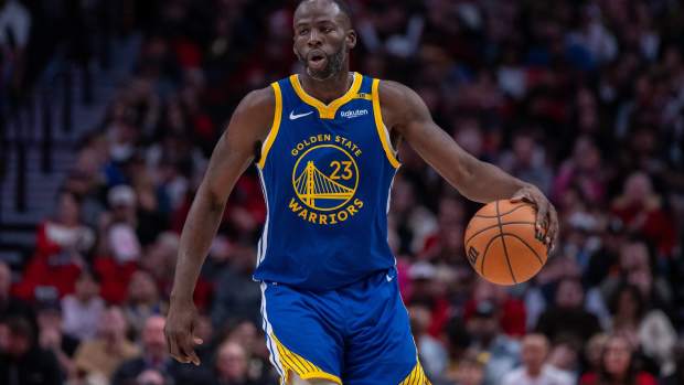 Portland, Oregon, USA; Golden State Warriors power forward Draymond Green (23) dribbles the ball against the Portland Trailblazers during the second half at Moda Center. Mandatory Credit: Stephen Brashear-Imagn Images
