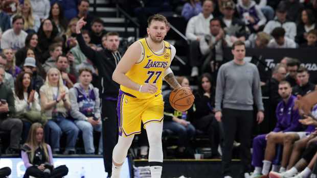 Salt Lake City, Utah, USA; Los Angeles Lakers guard Luka Doncic (77) dribbles during the second quarter against the Utah Jazz at Delta Center. Mandatory Credit: Chris Nicoll-Imagn Images